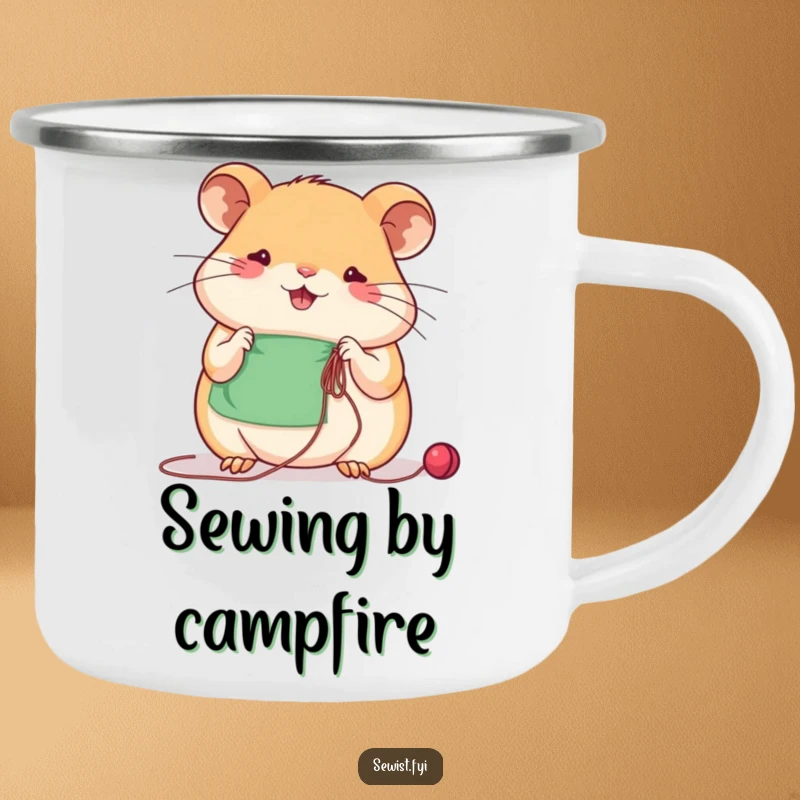 Funny beaming hamster sews with concentration using needle and thread, a durable camping mug for crafters.