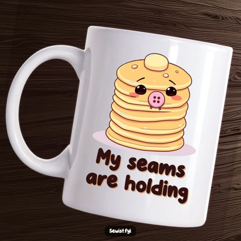 Funny pancake mug with a wobbly stack attempting to sew a giant button onto itself, showcasing a determined yet unstable crafting session.