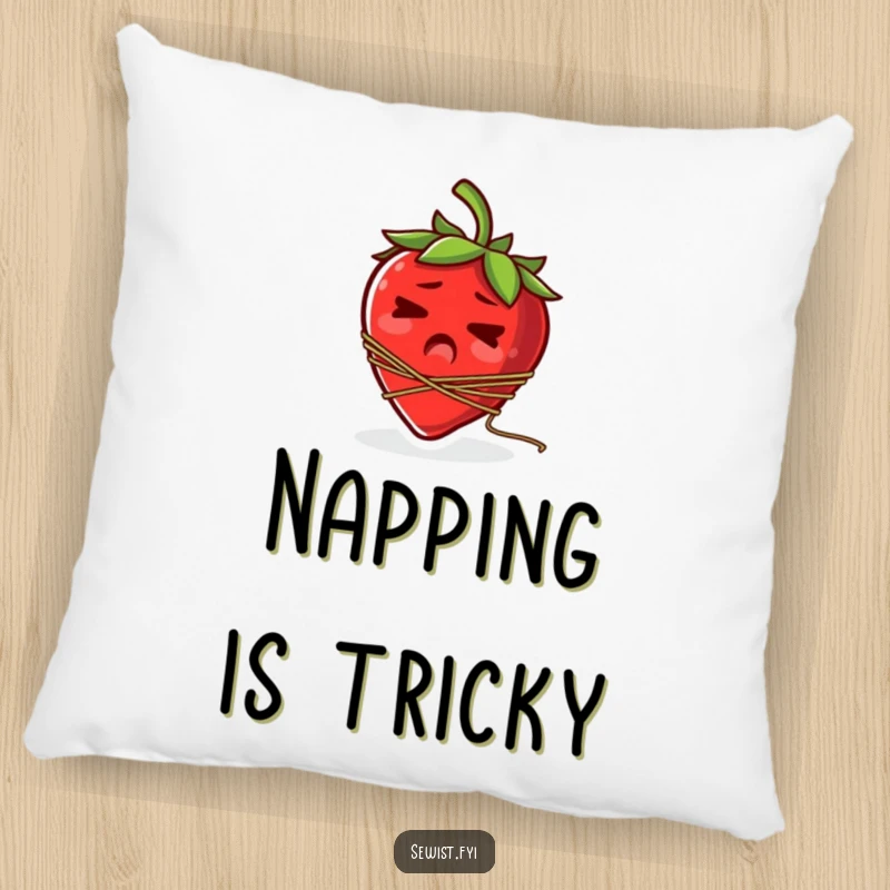 Funny pillow illustration of a startled strawberry hilariously tangled in a spool of thread.
