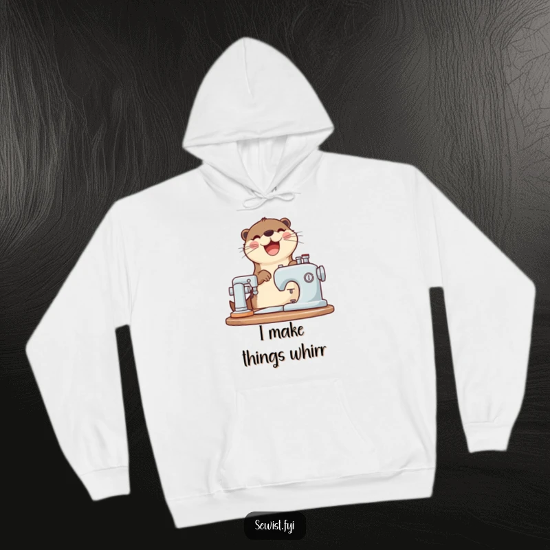 Funny otter hoodie with a joyful otter happily using a sewing machine, ideal for cozy crafting sessions.
