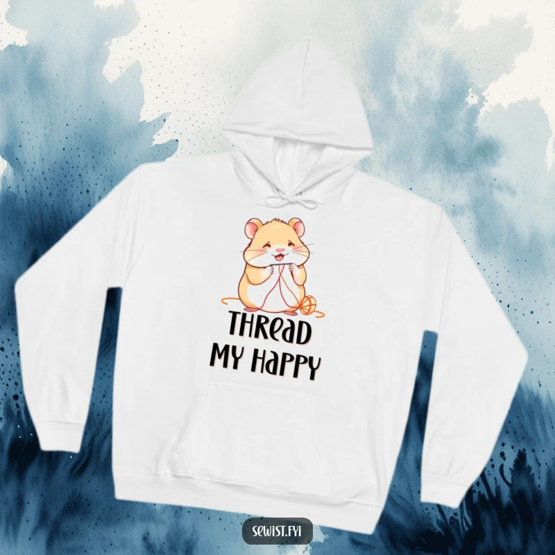Funny Hoodie: A smiling hamster carefully works a needle and thread, embodying focus and cozy crafting comfort.