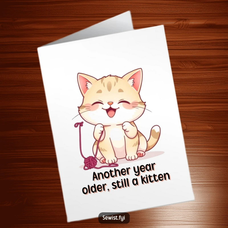 Funny Free Printable Birthday Card: Mischievous cat batting yarn happily, perfect DIY gift for cat lovers.