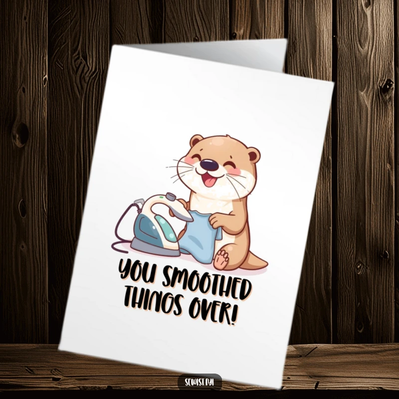 Funny Free Printable Congrats Card: An otter meticulously ironing a tiny garment with a determined, joyful expression.
