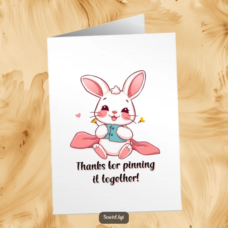 Funny free printable thank you card: A playful bunny smiling while pinning fabric sections.