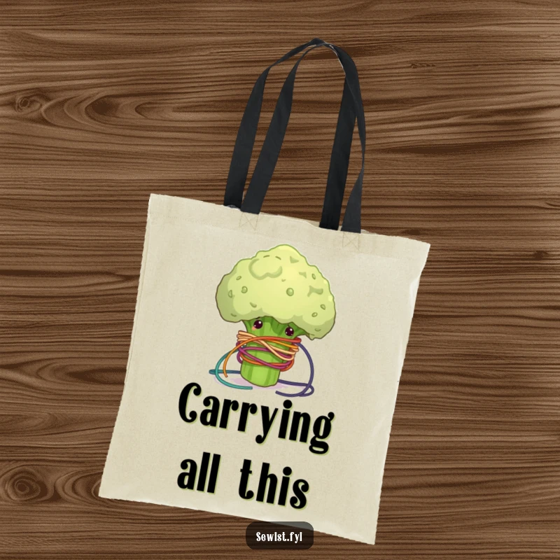 Funny tote bag illustrating a clumsy broccoli floret tangled in colorful sewing thread, a humorous and practical accessory.