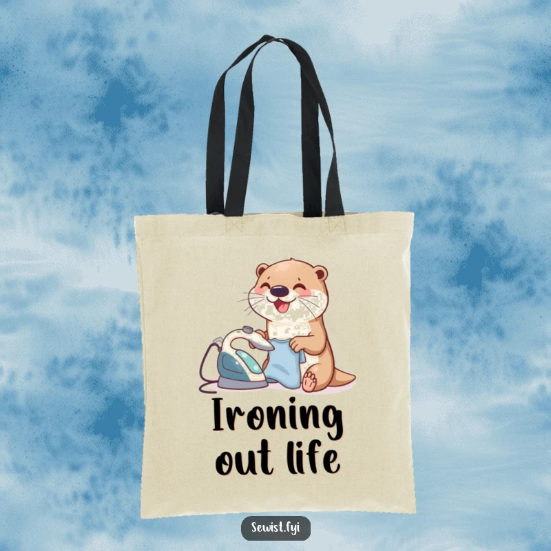 Funny Otter Tote Bag featuring a joyful otter ironing a small garment with a tiny iron, a humorous and practical accessory for errands.